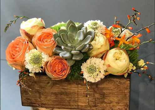 AUBE, Arreglo floral
